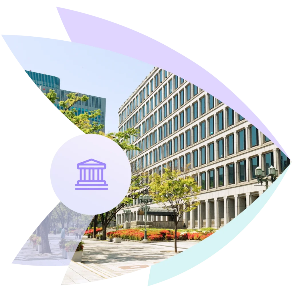 B&uuml;rogeb&auml;ude in urbaner Umgebung neben Symbol f&uuml;r Personalverwaltung.